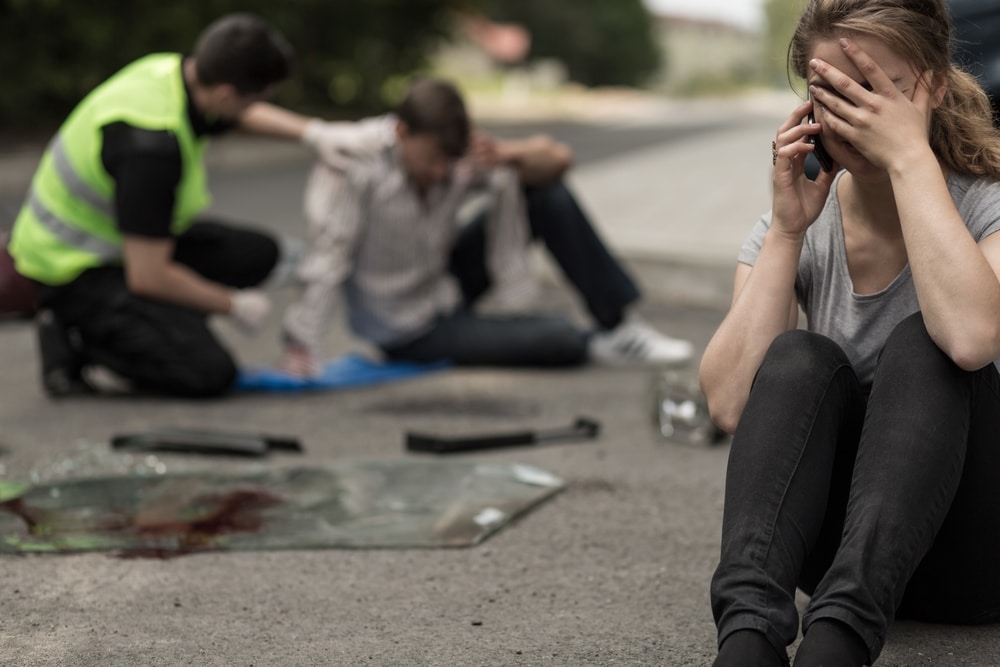 DespairYoungFemaleDriverAfterTrafficAccident