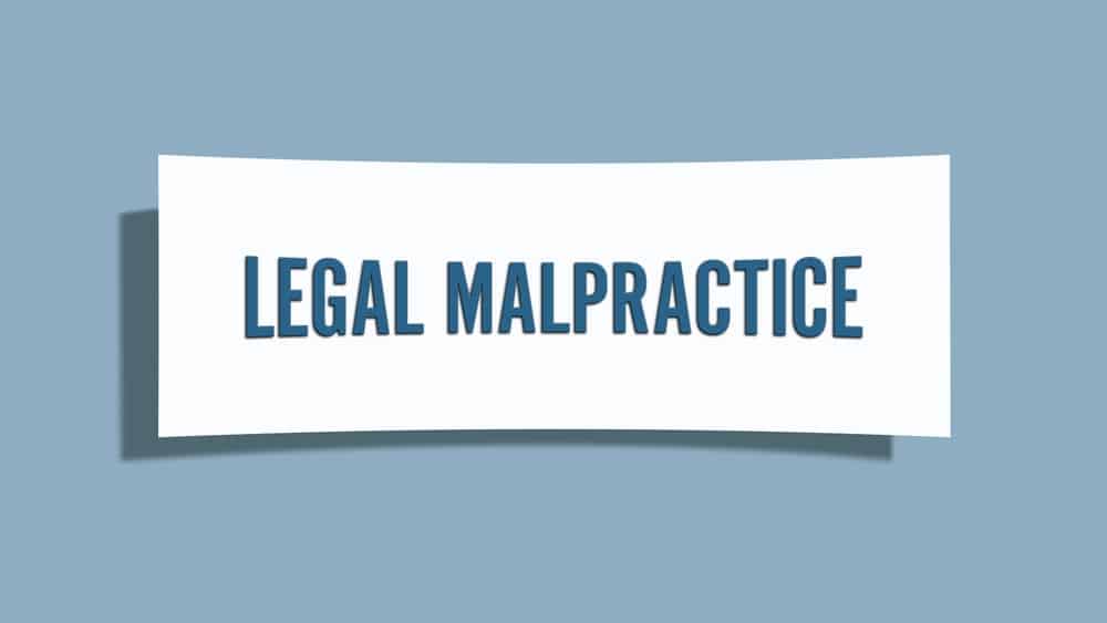 LegalMalpracticeACardIsolatedOnBlueBackground