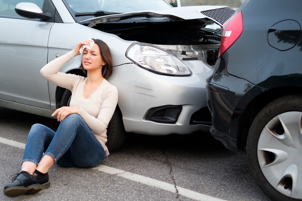 InjuredGirlAfterCarAccidentInTheStreet