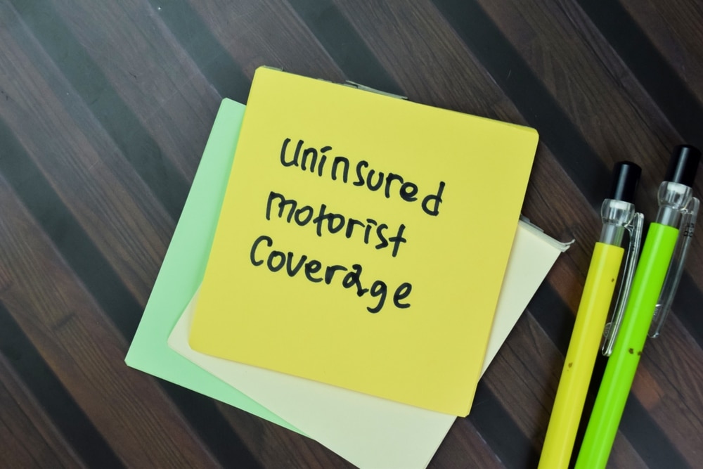 ConceptOfUninsuredMotoristCoverageWriteOnStickyNotesIsolated