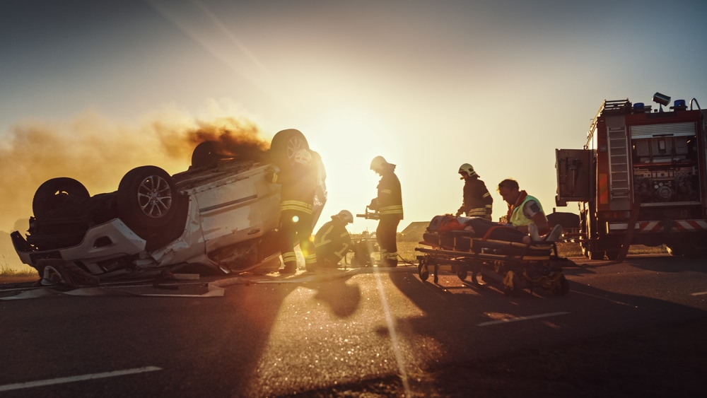 OnTheCarCrashTrafficAccidentParamedicsAndFirefightersRescue