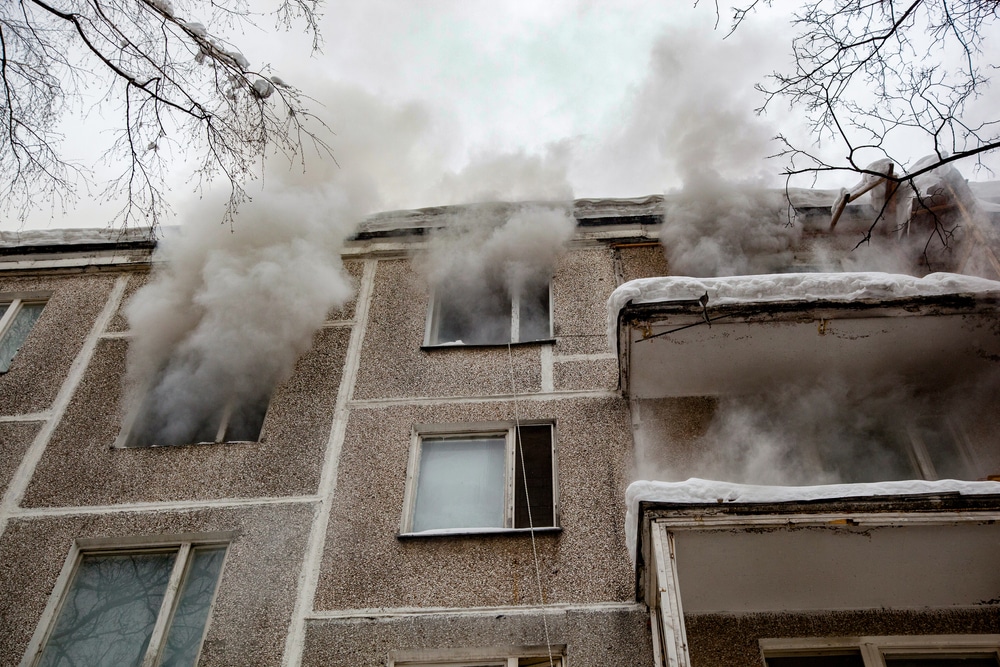 FireInAnApartmentBuildingFirefightersArrivedInFireTrucks