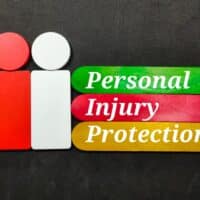 ColoredIceCreamSticksWrittenPersonalInjuryProtectionOnBlack ColoredIceCreamSticksWrittenPersonalInjuryProtectionOnBlack