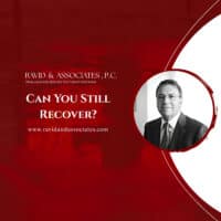 Red promotional banner for Ravid & Associates, trial lawyers; headline reads "Can You Still Recover?" with www.ravidandassociates.com and a circular portrait of a man in a suit.